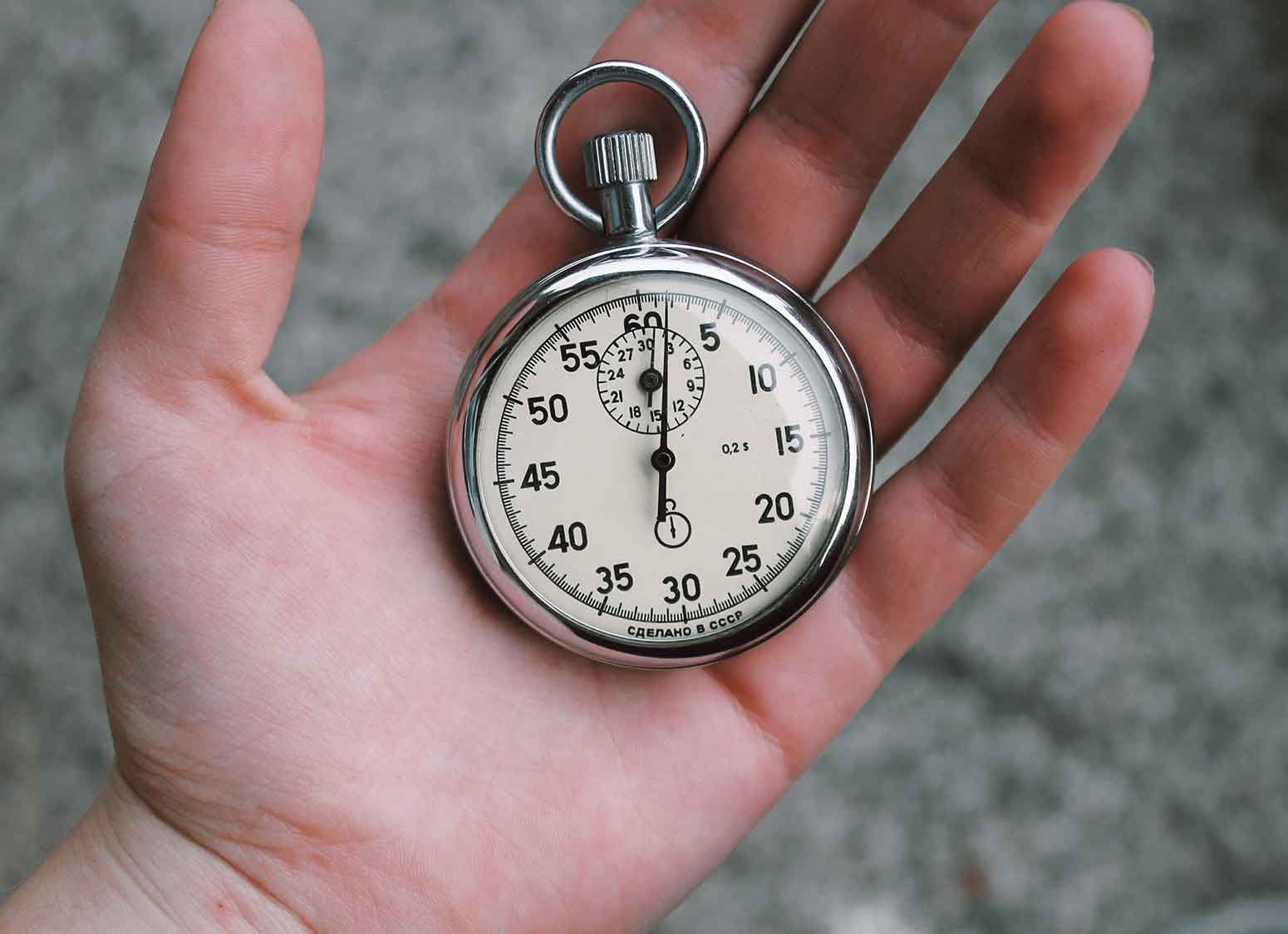 stopwatch in hand