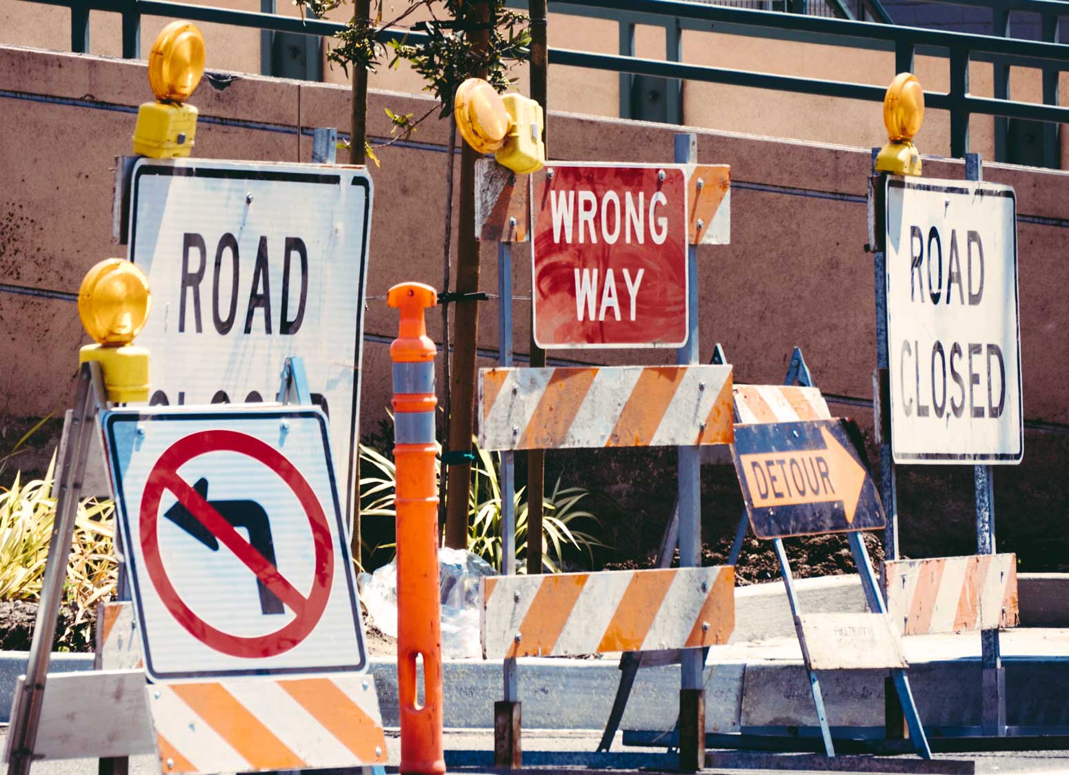 road closed and wrong way signs